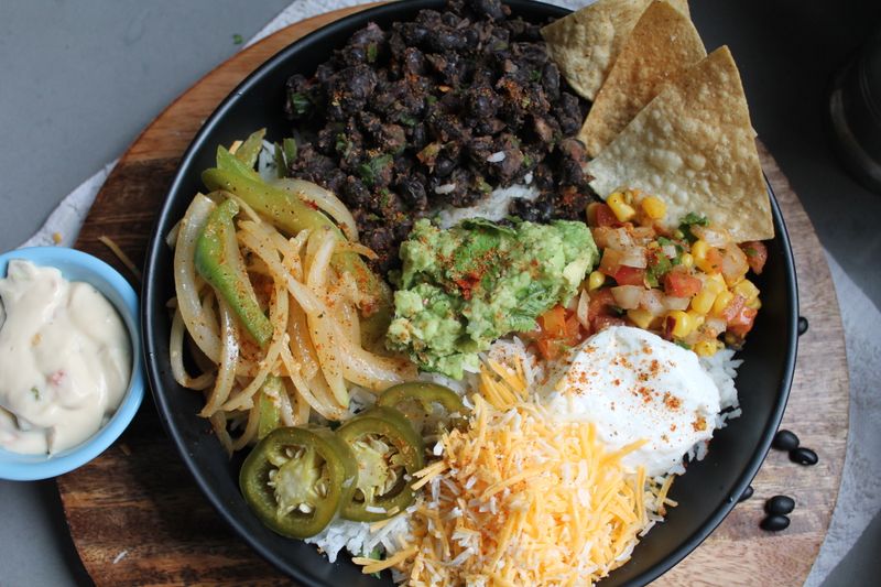 Veggie burrito bowl with black beans and guacamole