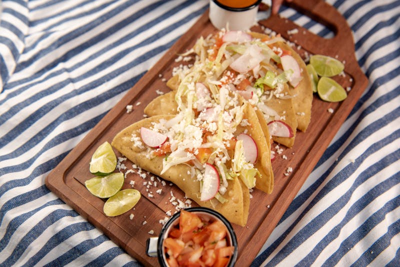 taco cabana signature taco platter with fresh salsa and lime