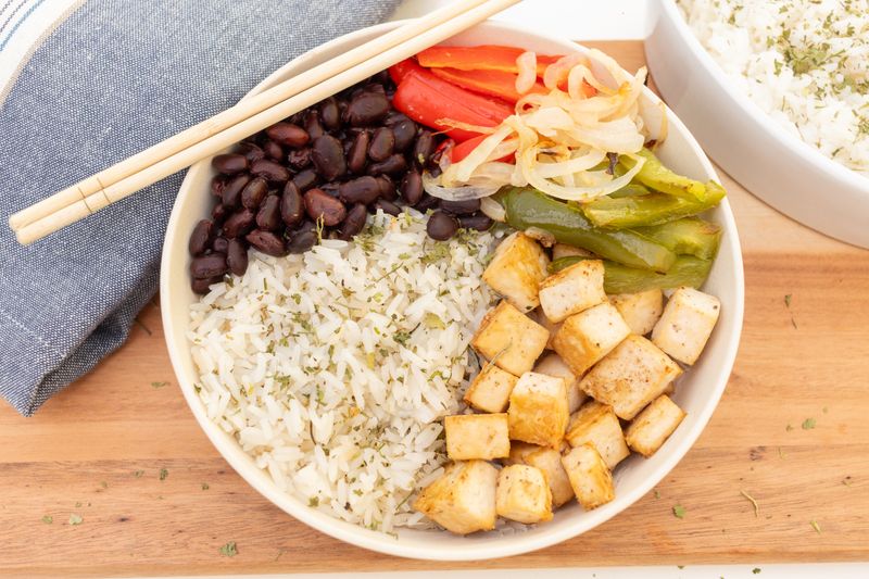 grilled burrito bowl with fresh vegetables from Cabana Taco